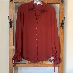 Womens Express clothing blouse in wine red. Gently worn, no snags or holes.